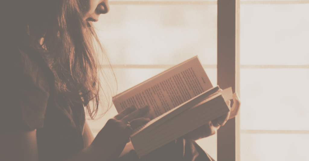 woman reading book